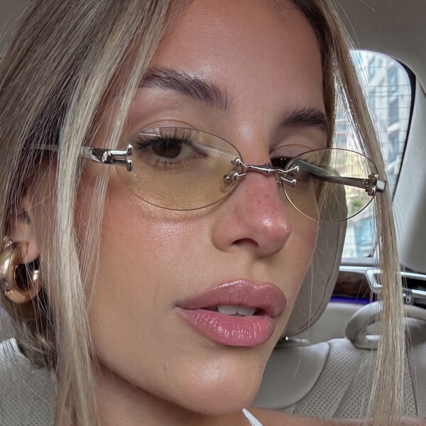 oly-5d7e0f68b3c338b678b79b88b8ab709e Wholesale Retro Oval Rimless Sunglasses Metal Frame UV400 Chic Fashion Accessory