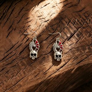 A pair of silver skull pendant ear hooks