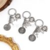 Wholesale Silver Metal Double Sided Cross Keychain with Hollow Heart Design Trendy Backpack Charm for Gift or Everyday Use