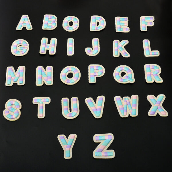 oly-615989854a3a6f4bd8a5f23eff216901 Wholesale Colorful Embroidered Letters Polyester Self-Adhesive Patches DIY Accessory for Clothes Bags Phones