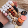 oly-6237b4f1168cb27e9314e1ed5ff5a252 Wholesale Trendy Silicone Bow Keychain Bracelet Mother's Day Gift Car Key Accessory