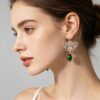 oly-638ce48fb3ba33ac347579e944b1eb41 Wholesale Hollow Butterfly Pendant Earrings - Trendy Zinc Alloy Plated Fashion Jewelry Accessory for Women