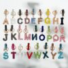 oly-638dd2224372a6f629ec973cd664cdf0 Wholesale Full Rhinestone English Letter Keychain Clay Bag Charm Car Key Accessory Gift Resale