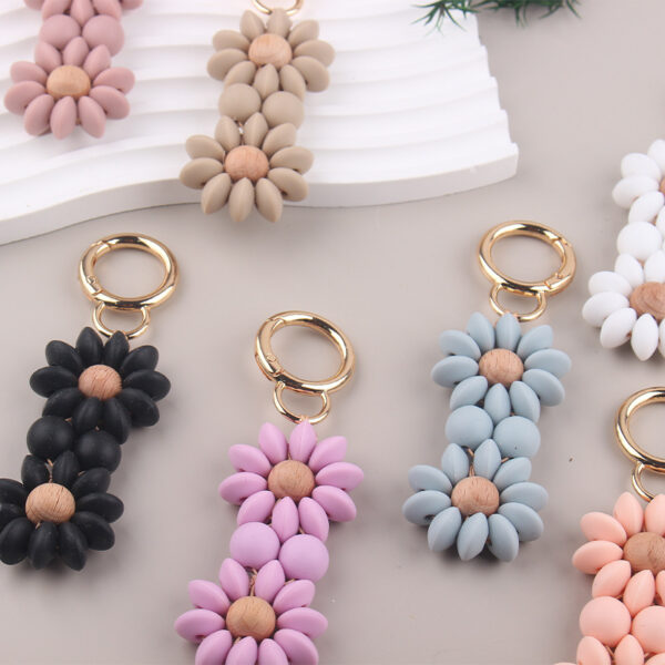 oly-63f4e0936e56469ed7b812e1cb50dc7a Wholesale Silicone DIY Beaded Bracelet Keychain Cartoon Flower Decorative Accessory Party Gift