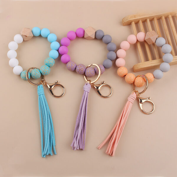 oly-64f6e14755604995b4d430931f52c8bd Wholesale European Style Silicone Bead DIY Bracelet Keychain with Leather Tassel Fashion Jewelry Accessory Gift