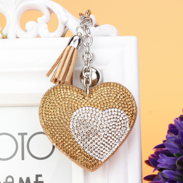 oly-64fa3086d706b00fd88cb59f422bd67e Wholesale Leather Rhinestone Heart Keychain with Tassel for Women Fashion Accessory