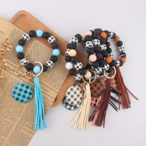 oly-673dc12997c58d9d1d14b11a1176aa8e Wholesale Plaid Wood Bead Tassel Silicone Keychain Fashion Accessory Boutique Resale Gift