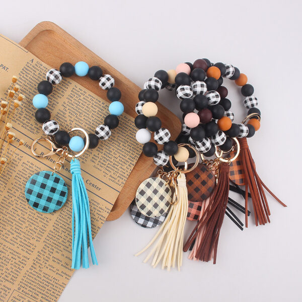 oly-673dc12997c58d9d1d14b11a1176aa8e Wholesale Plaid Wood Bead Tassel Silicone Keychain Fashion Accessory Boutique Resale Gift