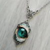 oly-675597d18fcc71da76d42d7785d7f858 Wholesale Mysterious Evil Eye Design Oval Alloy Pendant Necklace Fashion Jewelry Accessory for Gift Boutique Resale