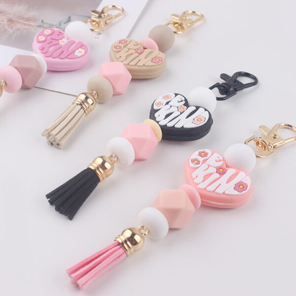 oly-67784ad890bba6d1f72a76b3289c2a25 Wholesale Silicone Heart Keychain Bag Charm Korean Style Pink Tassel Pendant Gift