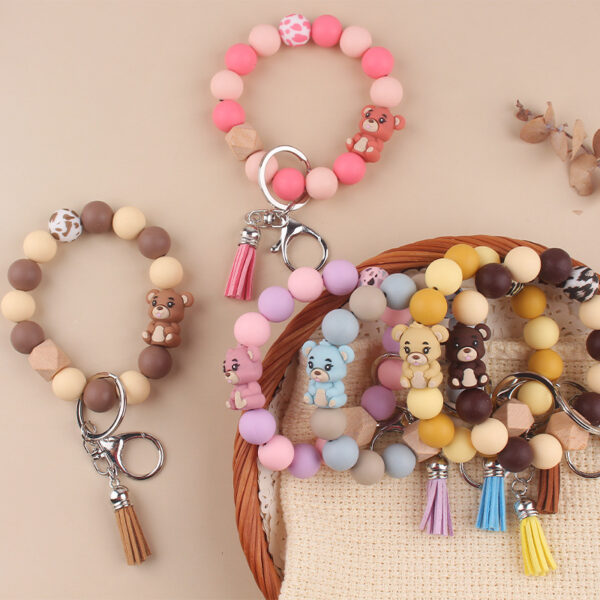 oly-683473195b51f64dff4ec1c1a805562b Wholesale Silicone Cartoon Bear Keychain Accessory Korean Style Gray Blue Cute DIY Bead Bracelet Gift