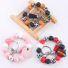 oly-6956e9d62c424a66fb5b71afbe0e41c2 Wholesale Design DIY Wrist Keychain Red Silicone Beaded Tassel Key Ring Accessory for Birthday Gifts