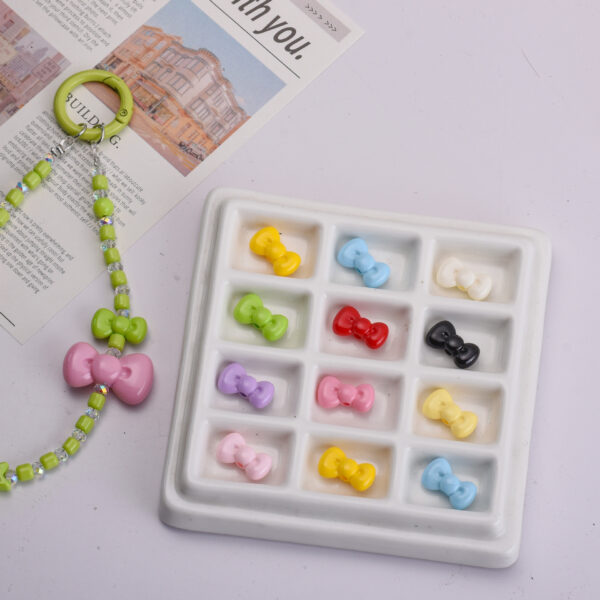 oly-69fd8349f6a186615ca810931bc0d74f Wholesale Acrylic Bow Loose Beads Mixed Colors Electroplated for DIY Jewelry Phone Chain Bag Charms Perfect for Boutique Resale