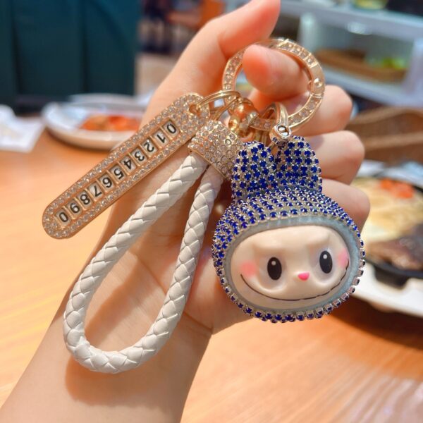 oly-6a722916129d21cebe07c8203150dc8f Wholesale Red Cartoon Sparkling Big Head Keychain, Trendy Bag Charm and Car Key Accessory for Everyday Use