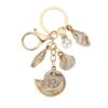 oly-6aa6d65bc9364827abb1583ca18e866f Wholesale Resin Gold Plated Shell Keychain Pendant for Bag Car Decoration Boutique Resale