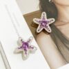 oly-6ac85788d1ed302fa38f8d58b435e919 Wholesale Electroplated Pink Alloy Pentagram Starfish Loose Beads for DIY Bag Charm