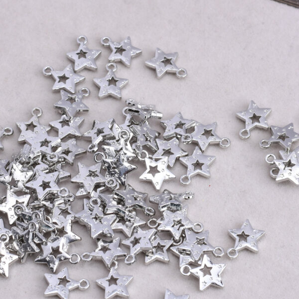 oly-6b1172db3d4cf32276e89f829379a581 Wholesale Hollow Five Pointed Star White Tone Alloy Charm DIY Jewelry Bag Charm Fashion Accessory