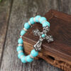 oly-6b3bacb7c6875db0f77d3c3d7a13fcee Wholesale Vintage Carved Cross Western Cowboy Blue Bead Bracelet Alloy Fashion Accessory