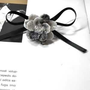 One gray two-color bead