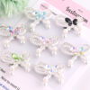 oly-6d754fc3b9714d6fa7e79864b16271c2 Wholesale Casual Rhinestone Bow Beads Alloy DIY Bag Charm Keychain Accessory