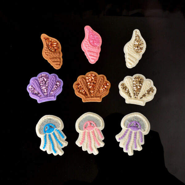 oly-6e7bc23ad56540d9db1ac2a02cb82c30 Wholesale Cartoon Purple Starfish and Seashell Sequin Patches for Bag Decoration and Clothing Repair Fashion Accessory