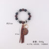 oly-6f4b630b58831bba9b0464d2303b638b Wholesale Plaid Wood Bead Tassel Silicone Keychain Fashion Accessory Boutique Resale Gift