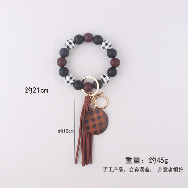 oly-6f4b630b58831bba9b0464d2303b638b Wholesale Plaid Wood Bead Tassel Silicone Keychain Fashion Accessory Boutique Resale Gift