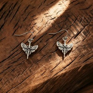 A pair of silver skull butterfly dagger pendant ear hooks