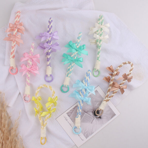 oly-7090c04a0df17a35fca4a516b48c22cc Wholesale Silicone Bow Keychain Cute Candy Color Bag Charm for Women