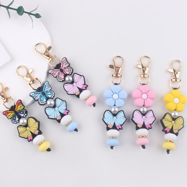 oly-71f7c6396e0dd79a3e2bb297b82f55bb Wholesale Korean Style Silicone Butterfly Flower Keychain DIY Decorative Accessory Gift