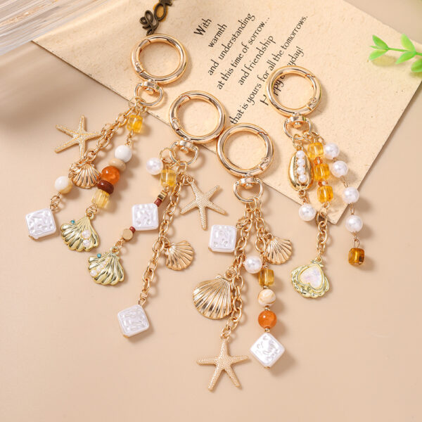 oly-71ffa90d90b27b097d27147878a2e7c5 Wholesale Sea Star Pearl Keychain Zinc Alloy Bag Charm Decorative Car Key Accessory