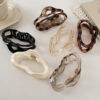 oly-7206b29e73d9ae0436812f105ed41273 Wholesale Plastic Hair Claw Clip Irregular Liquid Line Stylish Hair Accessory for Women