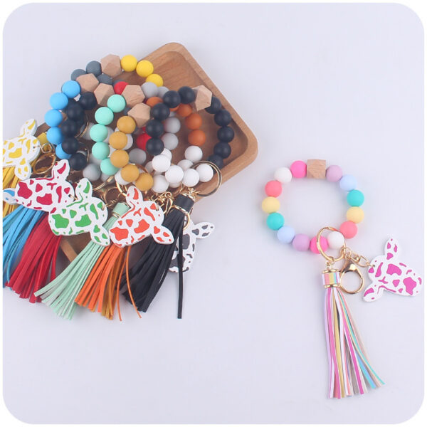oly-72741eaecb5586664c7ad1b1d6d91228 Wholesale Western Style Bull Head Keychain Bracelet Silicone Bead with Tassel Fashion Accessory