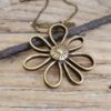 oly-730679a337fc0b3fe607682ed6ce833a Wholesale Ancient Gold Alloy Flower Pendant Necklace for Women Gift Jewelry Accessory