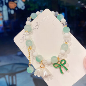 Green lily of the valley flower bow bracelet (opp bag)