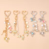 oly-746e3746ff8b86c23ad2adc423302fcf Wholesale Modern Minimalist Bow Bead Keychain, Zinc Alloy Star Heart Design, Casual Bag Charm Accessory
