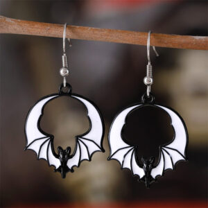 Pair of white and black bat earrings