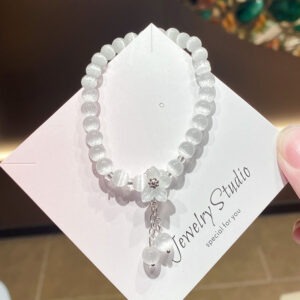 Transparent white cat eye glass flower bracelet bag