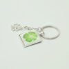 oly-764810a15dd07dc890f0c8771baff856 Wholesale Luminous Four Leaf Clover Keychain Pendant Fashion Jewelry Accessory for Gift or Boutique
