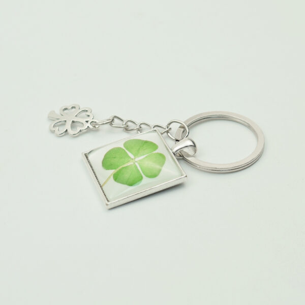 oly-764810a15dd07dc890f0c8771baff856 Wholesale Luminous Four Leaf Clover Keychain Pendant Fashion Jewelry Accessory for Gift or Boutique