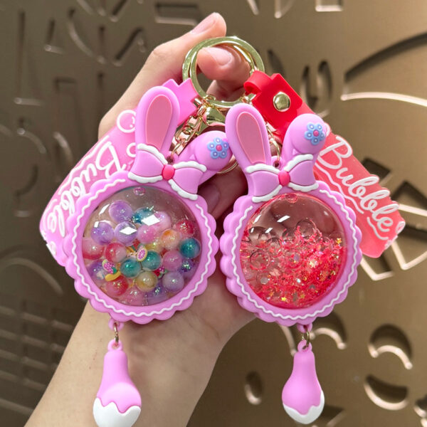 Wholesale Cartoon Rabbit Ear Oil Filled Keychain Pendant Bag Charm Gift