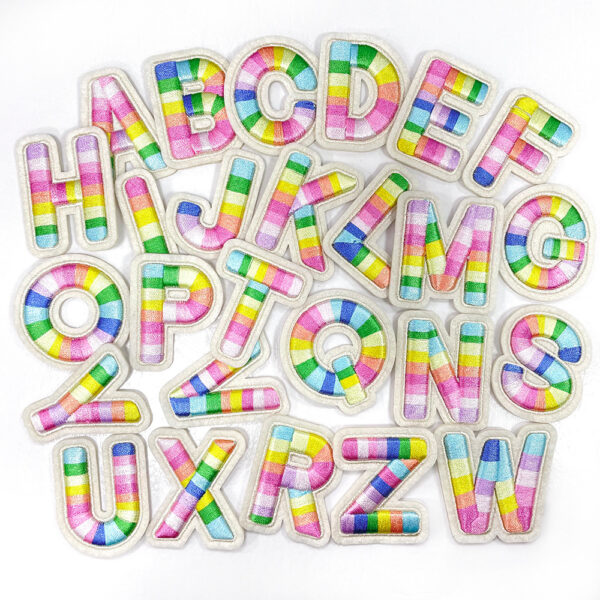 oly-77a4e4faa24b53339c002d9177570f52 Wholesale Polyester Embroidered Letter Patches Rainbow Design Self-Adhesive for Shoes Hats