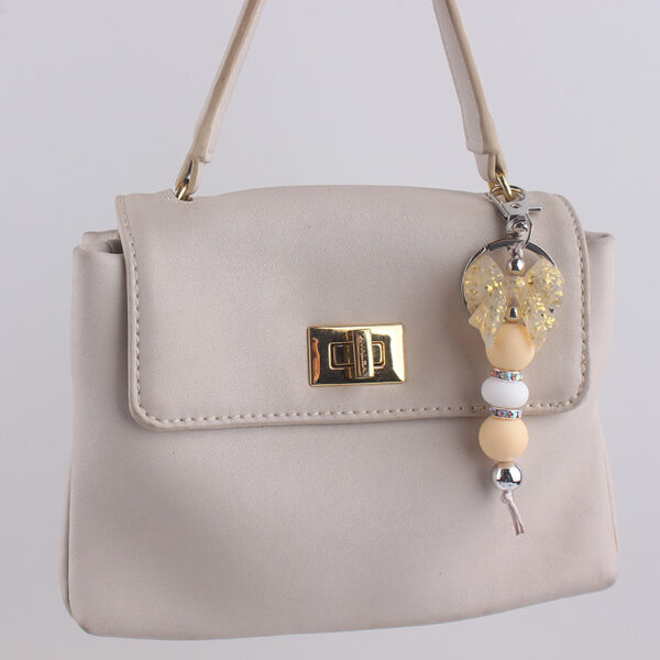 oly-78e4aec12358e1800bad2d9fa9151e60 Wholesale Silicone Bow Beaded Bag Charm Keychain Fashion Accessory Gift for Party