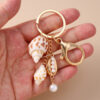 oly-7902ac75498a42591631044cea0be686 Wholesale Chic Resin Shell and Starfish Keychain - Beachy Decorative Accessory for Bag or Keys, Perfect Gift