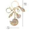 oly-7948ad5271676bdfa278e05f4ca819e6 Wholesale Resin Gold Plated Shell Keychain Pendant for Bag Car Decoration Boutique Resale