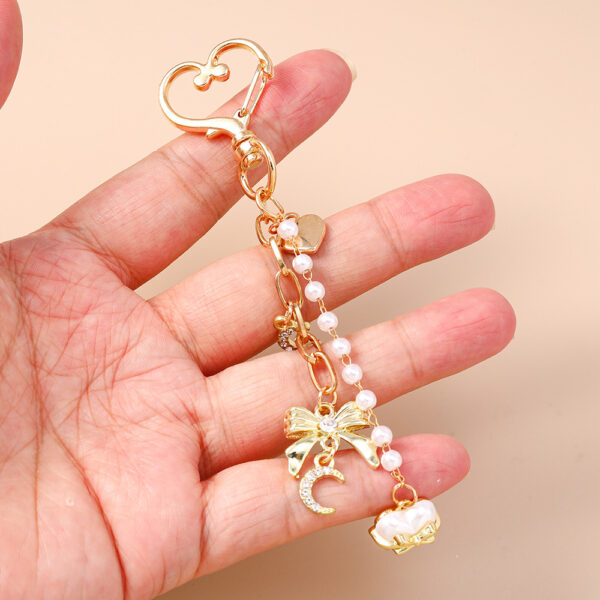 oly-7a14b56a0284d0bedd130bb68a6a55b6 Wholesale Modern Minimalist Bow Bead Keychain, Zinc Alloy Star Heart Design, Casual Bag Charm Accessory