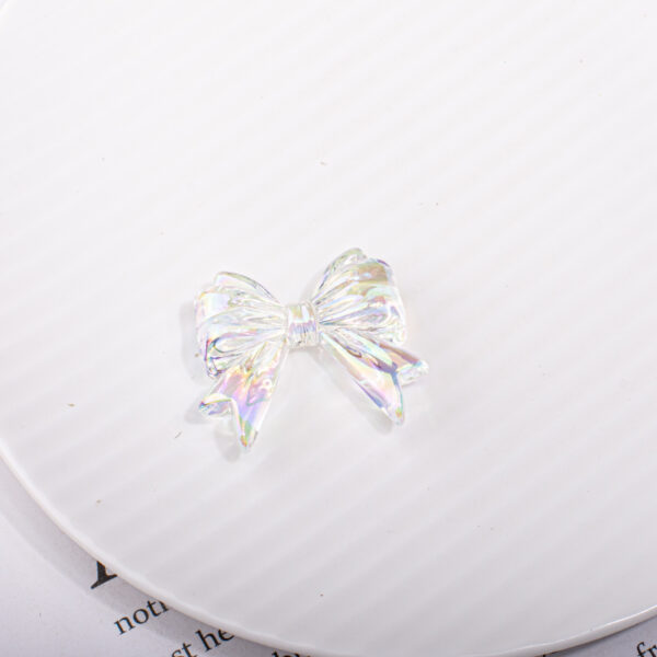 oly-7ae48940748eb0dd09981947f645d80a Wholesale Bow Tie Butterfly Knot Acrylic Loose Beads Transparent UV Plated for DIY Phone Chain Making