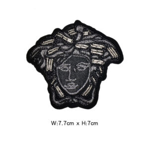 Black and gray character badges