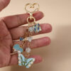 Wholesale Blue Zinc Alloy Heart Butterfly Keychain Trendy Bag Charm for Backpacks Bags