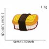 oly-7f38f18458a26d30939f88547bd0e544 Wholesale Polyester Embroidered Patch Cartoon Salmon Rice Ball Fashion Accessory